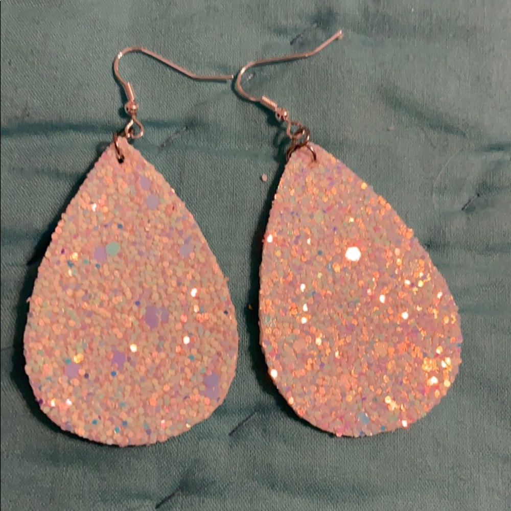 Iridescent glittery earrings.